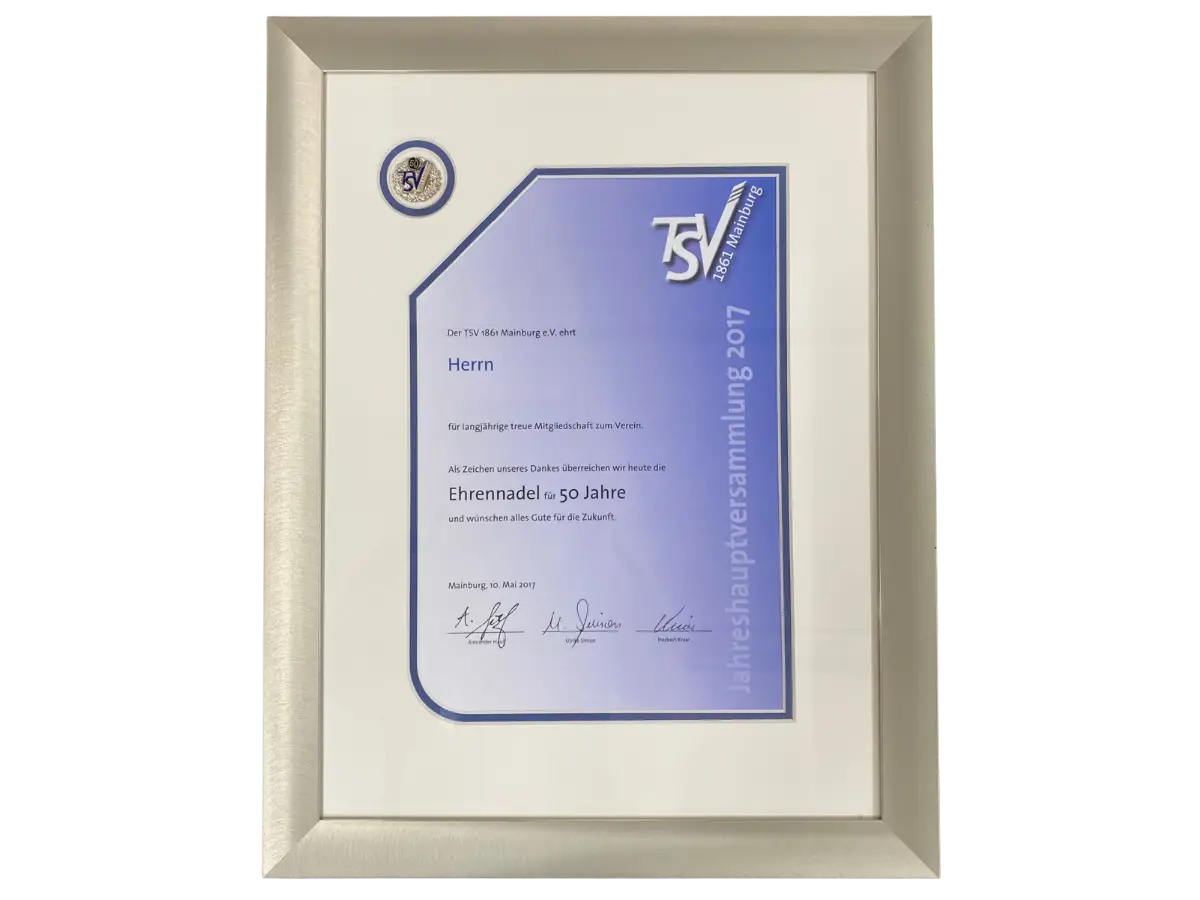 Urkunde mit Ehrennadel im Passepartout integriert